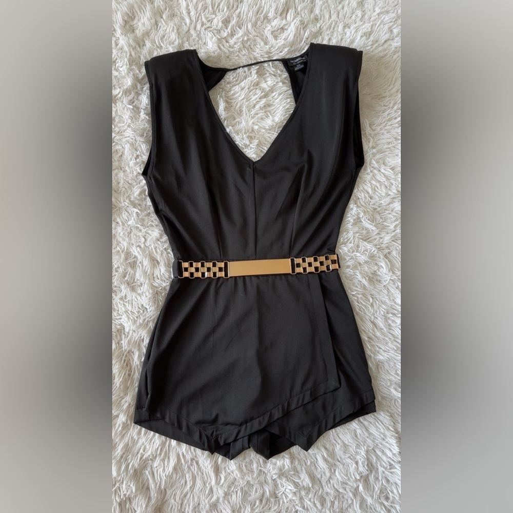 Chic Black and Gold Romper with Modern Silhouette